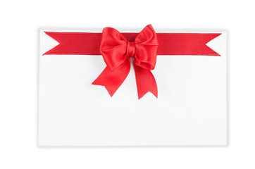 Note card with ribbon bow on white background