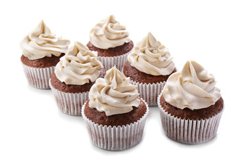 Tasty chocolate cupcakes, isolated on white