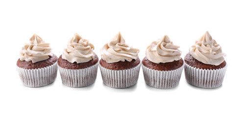 Tasty chocolate cupcakes, isolated on white