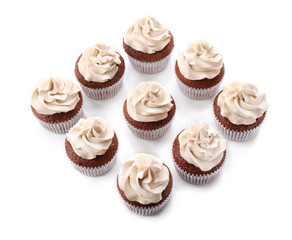 Tasty chocolate cupcakes, isolated on white