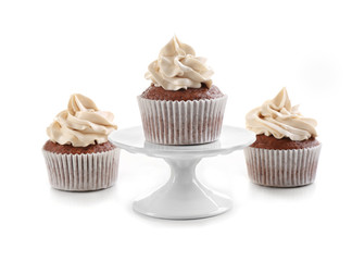 Tasty chocolate cupcakes, isolated on white