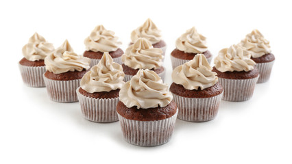 Tasty chocolate cupcakes, isolated on white