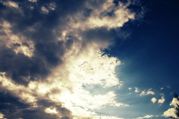sky with clouds and sun background