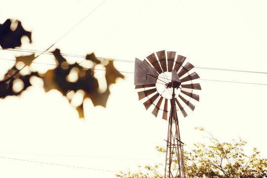 Low angle view of windmill against clear sky