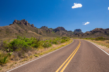 Beautiful cinematic view of the road under the blue cloudless sky in America