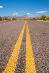 Beautiful cinematic view of the road under the blue cloudless sky in America