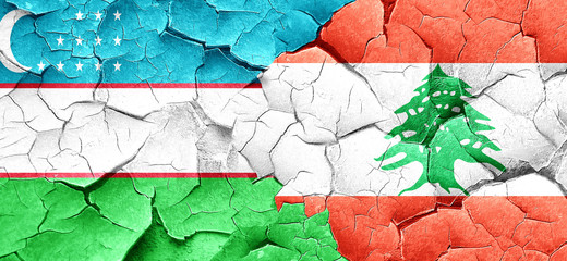 Uzbekistan flag with Lebanon flag on a grunge cracked wall