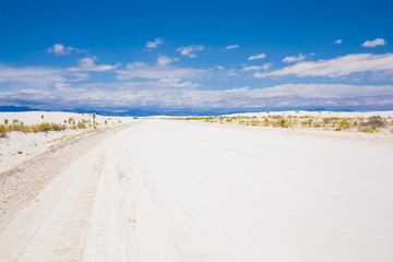 Beautiful cinematic deserted nature view under the blue cloudless sky in America. White sands.