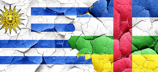 Uruguay flag with Central African Republic flag on a grunge crac