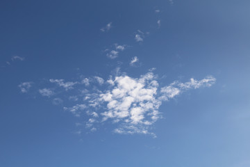 Naklejka na ściany i meble Cloudy blue sky