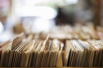 Stack of various records in box