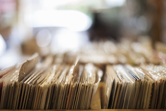Stack of various records in box