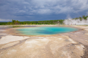 Beautiful cinematic view of nature landscape in the American West under the blue cloudy sky. Geyser.