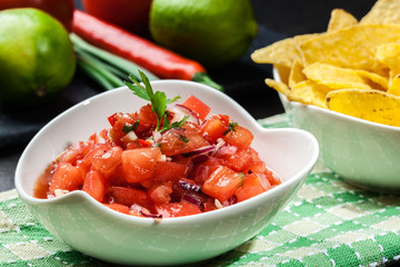 Bowl of fresh salsa with tortilla chips
