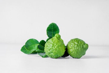 Bergamot fruit on white wooden  background .