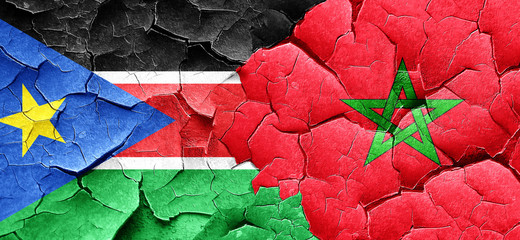 south sudan flag with Morocco flag on a grunge cracked wall