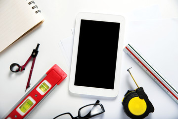 engineering objects on desk background. top view