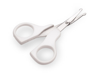 Open white baby scissors on the white