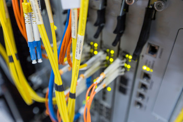 Fiber optic cable connect to network switch in data center..