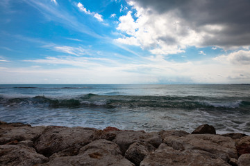 Fototapeta na wymiar Beach, sea and waves
