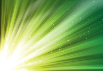 Yellow and green glitter sparkle defocused rays lights bokeh abstract background.