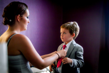 Mother Dresses Son For Wedding
