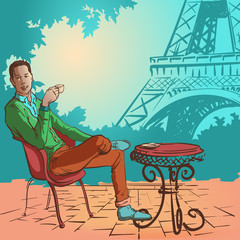 Young man drinking coffee in Paris contrast
