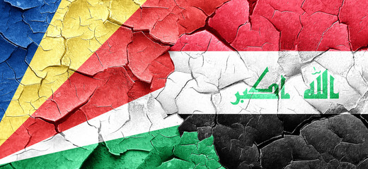 seychelles flag with Iraq flag on a grunge cracked wall