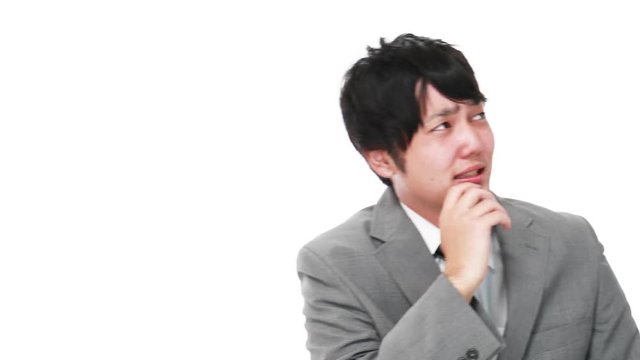 悩むビジネスマン