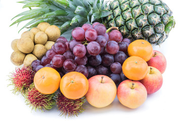 Assortment of exotic fruits isolated on white background