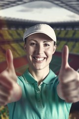 Composite image of sportswoman posing on black background