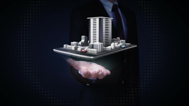 Businessman open palms, real estate application, constructed building city on a smart phone,mobile, smart pad, tablet.