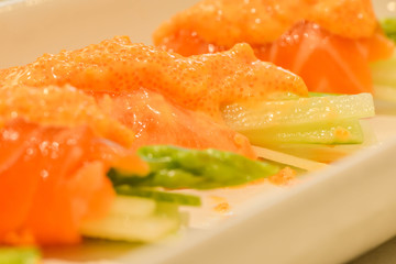 Macro image of salmon sashimi sauce
