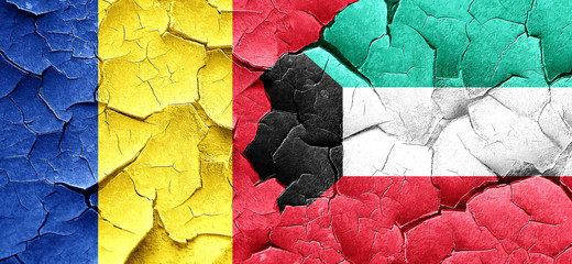 Romania flag with Kuwait flag on a grunge cracked wall