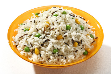 Dish of black & white rice in an orange plate  on white background. Close up, high resolution product.