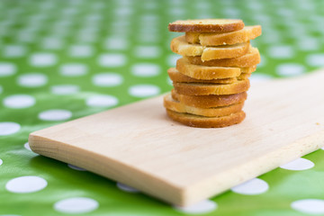 Pile of bruscettas bread on the wooden board