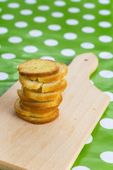 Pile of bread toasts on the wooden board