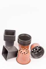 Black and orange square and round flower pots