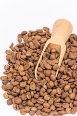 Close up macro coffee beans over white background