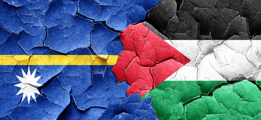 Nauru flag with Palestine flag on a grunge cracked wall