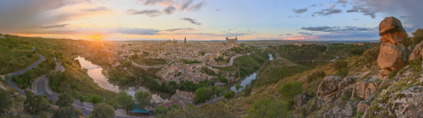 Fototapeta na wymiar Panoramic view of ancient city and Alcazar on a hill over the Tagus River, Castilla la Mancha, Toledo, Spain.