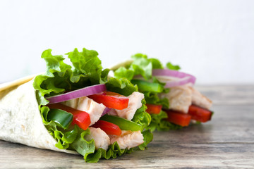Mexican fajitas on wooden table

