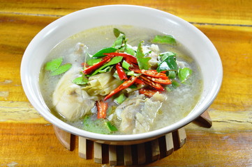 chicken leg spicy and sour soup on bowl