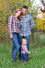 Fototapeta premium Family in the autumn wood