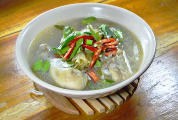 chicken leg spicy and sour soup on bowl