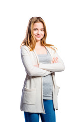 Girl in jeans and long sweater, woman, studio shot