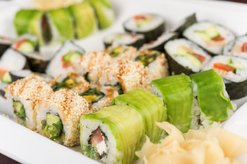 sushi rolls on white plate