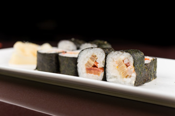 sushi rolls on white plate