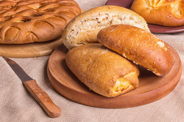 sweet buns on a wooden board