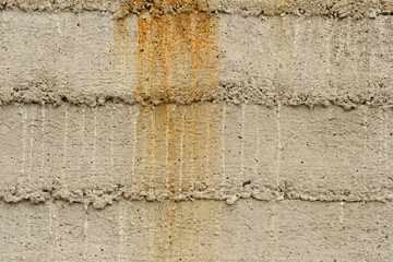 Wall fragment with scratches and cracks